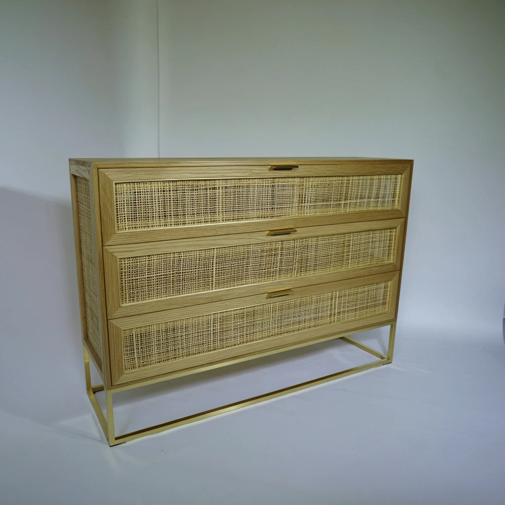 Light brown wooden chest of drawers with three wide storage drawers, featuring a sleek and simple design.
